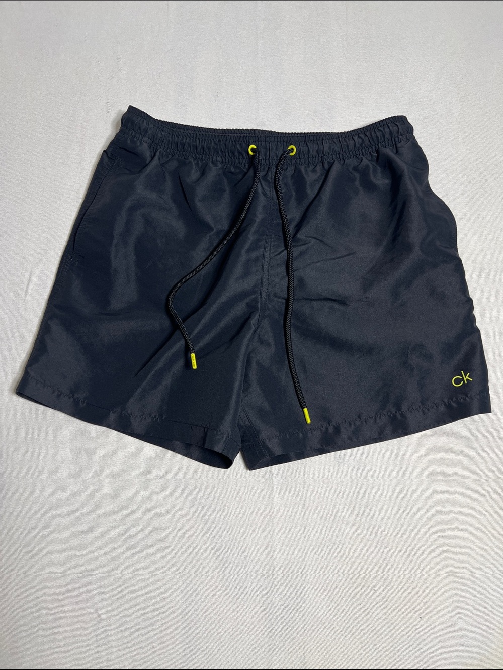 Calvin Klein Dark Navy Swim Trunks with Neon Yellow Accents